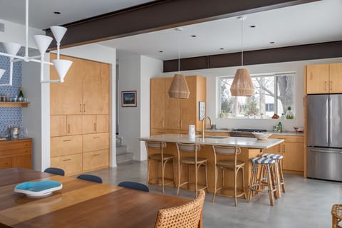 Efficient storage in the open plan kitchen with modern conveniences