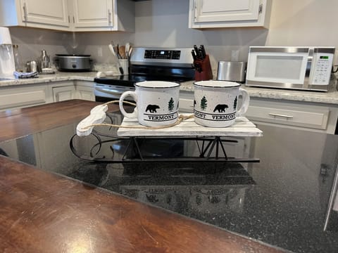 Vermont mornings begin here — coffee at the kitchen island.