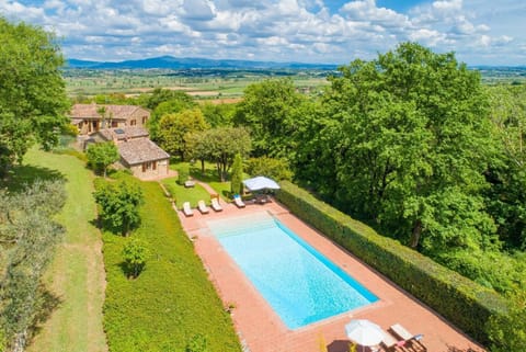 Beautiful villa with private pool, terrace, and garden with countryside views