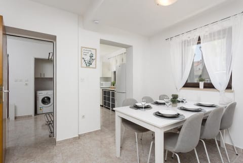 Ground floor: dining room with A/C