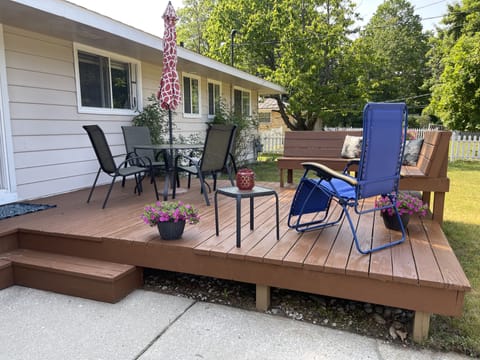Peaceful deck off back of house. Slider opens into dining/kitchen.