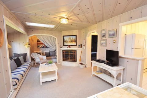 A comfortable living space with a charming fireplace and a streaming-only TV for all your favorite shows and movies