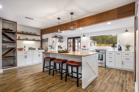 Spacious kitchen with bar stool seating