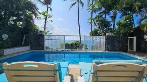Private pool is backed by the ocean