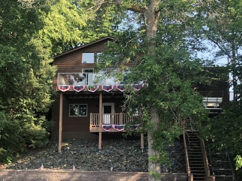 Lake side of property, tons of windows for amazing lake views