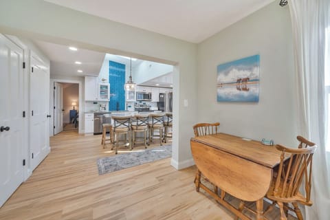 Small table has 2 leaves to accommodate the whole gang if needed.