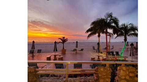 Evening view by the pol and patio.