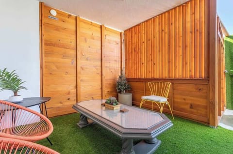 A private outdoor patio off of the kitchenette is the perfect outdoor living room for relaxing after exploring the LA sights.
