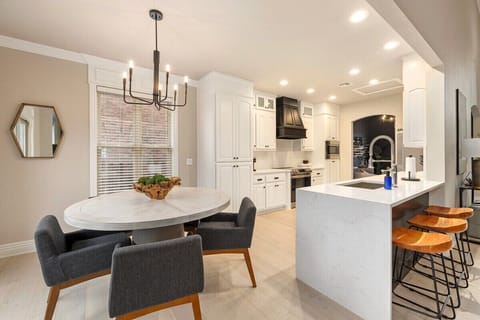 Our kitchen was designed with your crew in mind! Enjoy a quick cup of coffee at the bar or gather around the dining table to enjoy your favorite meals.