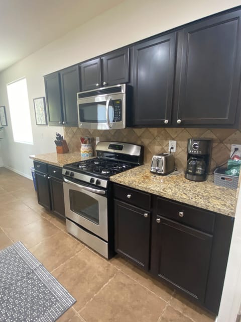 A full, well stocked and clean kitchen.