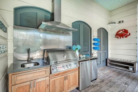 Covered Outdoor Grill Area with Gas Grill