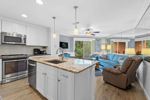 Updated kitchen and appliances with a breakfast bar for 3.