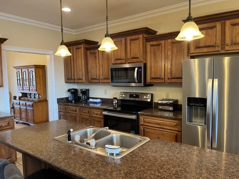 Updated stainless steel appliances and a well stocked kitchen to feed a crowd
