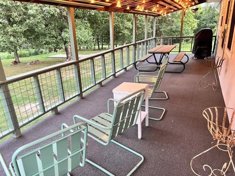 Balcony with propane grill.