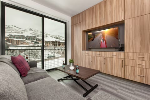 Large Screen HD TV with Cable and Plenty of Cabinets to Store Your Personal Items