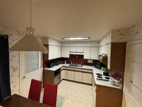 Kitchen with stove and other appliances.
We do not have a large oven.