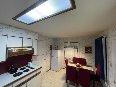 Fridge and freezer, with a closer look at the stove. Note - No conventional oven