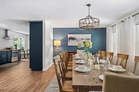 The open living area is perfect for hosting friends and family as it features a gourmet kitchen that opens up to the large dining area and a beautiful lounge. Open floor plan feels bright and airy.