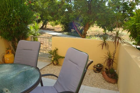 Private garden with gate leading to pool