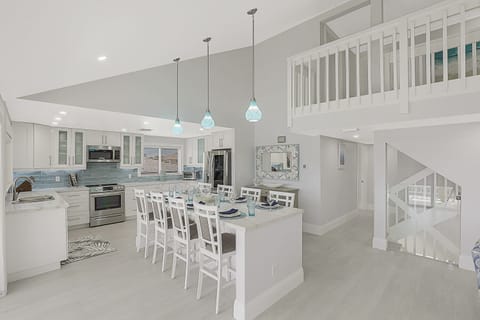 Island kitchen w/ stainless appliances including 35 CF luxury refrigerator