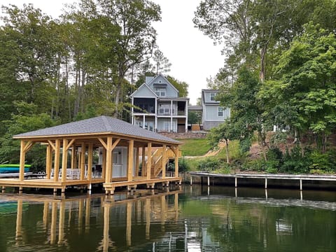 Cala Tortuga from the water with brand new boathouse.  - Hosted by CalaTortugaOnLakeGaston