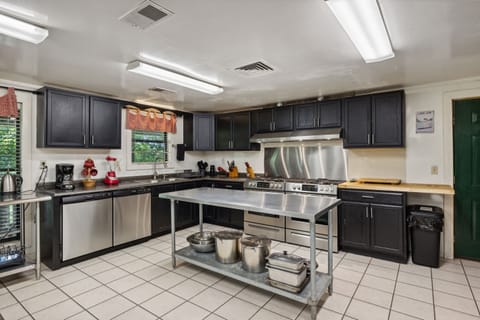 2 dishwashers and 2 gas stoves- lots of prep space