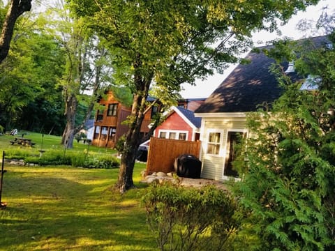 The private back side of Curry Place, steps to the Squam Channel & your dock!