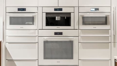 Built-in coffee maker, microwave, steam oven, convection oven, warming drawer