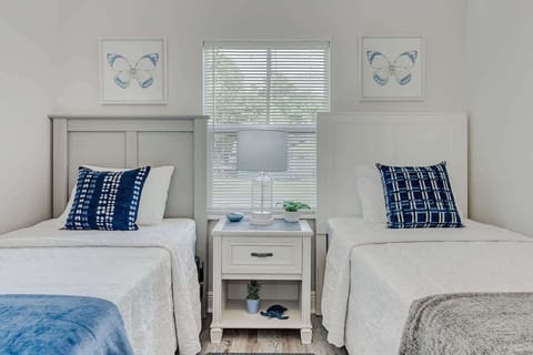 Discover our twin-bed retreat—a symphony of comfort. Each mattress cradles you, and the linens cocoon you in softness. Whether it’s a sibling sleepover or a best-friend getaway, this room whispers ‘bond, dream, repeat.
