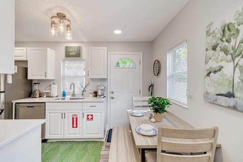 Our eat-in kitchen is bathed in natural light, creating a cheerful and inviting atmosphere. 