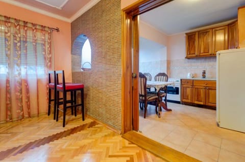 The kitchen is fully equipped for cooking and has basic ulitities