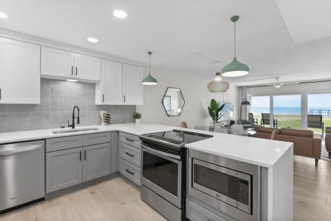 Sleek modern kitchen with a spacious island, stainless steel appliances