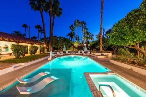 Pool with lounging platform and hot tub that heats up in minutes
