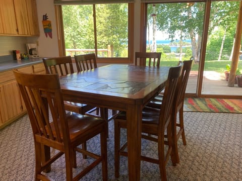 Enjoy meals, family games, and watch wildlife with full views of lake and bay.