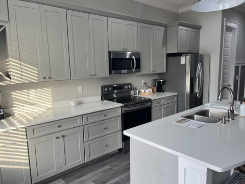 Kitchen with large island and bar seating 
