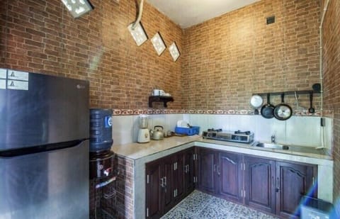 Closed kitchen fully with utensils and kitchen appliance