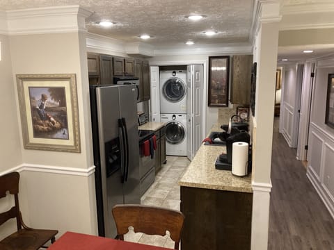 Kitchen includes basic oil / spices, blender, coffee, microwave, & toaster oven.