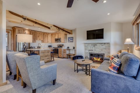 Living room with wood-burning fireplace
