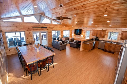 Great Room has comfy leather seating for 8 with 55" 4K TV, Yamaha soundbar.