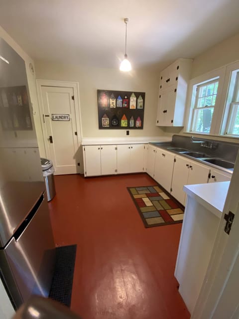 Adjacent second kitchen space, fully stocked, including very large basin sinks