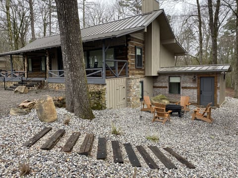 Rail tie steps leading to 2nd entrance downstairs root cellar bed and bathroom.