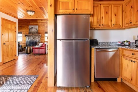 Beautiful Hardwoods Throughout- granite countertops and stainless steel appliances