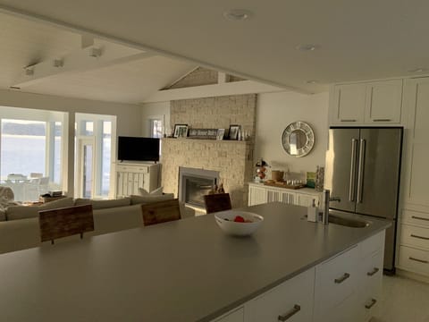 Large kitchen island with view of the lake. Very well stocked with everything 
