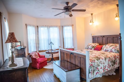 The Delaine room features a King bed, twin trundle and sitting area. 
