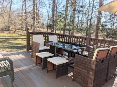Enjoy morning coffee or meals on the peaceful back deck.