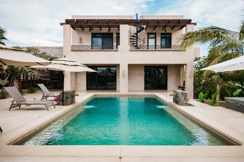 42ft heated pool with umbrellas and 8 loungers with cushions