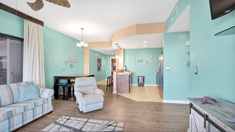 Comfortable seating and dining area for relaxing after a fun day on the beach!