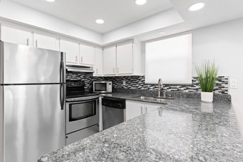 Sleek and updated kitchen with plenty of counter space