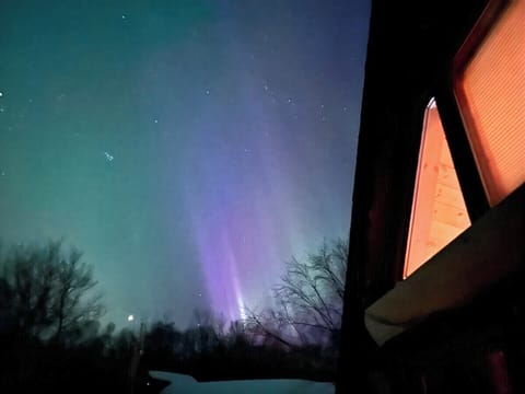Photo from our balcony from one of our guests in 2023.  Once in a while, we get a super nice show of the aurora borealis.  