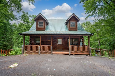 Front of cabin and 2 parking spots.